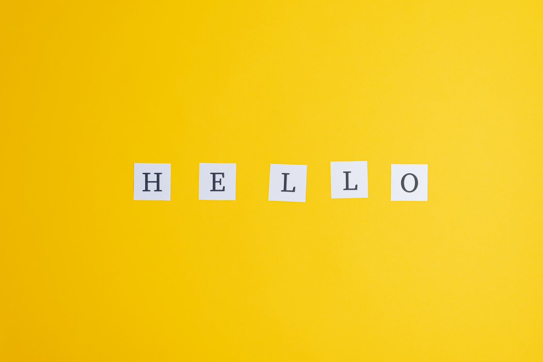 Hello Sign on White Post It Papers